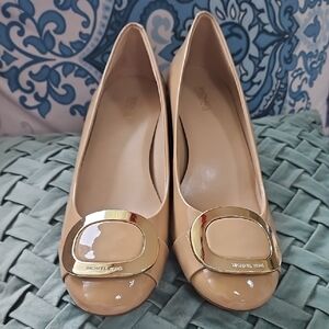 Michael Kors Nude Patent Leather Heels with Gold Buckle Accent